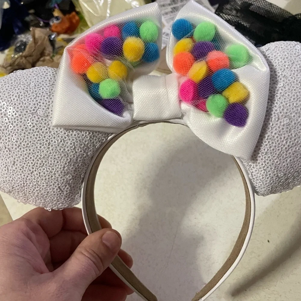 Sparkling White Sequin Headband with Vibrant Pom-Poms